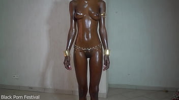 Glistening Obsidian Skin And Slick, Oiled Breasts