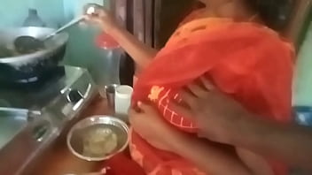 Aunty’s Steamy Kitchen Seduction: Her Skilled Hands Stroking A Young Stud’s Throbbing Cock