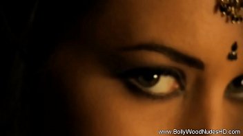 Seductive Dark-haired Beauty Exudes Raw Sensuality