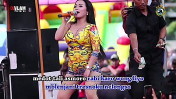 Two Gorgeous Singers Writhe And Grind In A Wild, Seductive Dance, Surrounded By A Crowd Of Hungry, Lustful Men.